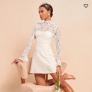 Reformation Carraway Dress
Size: 4
Color: Ivory